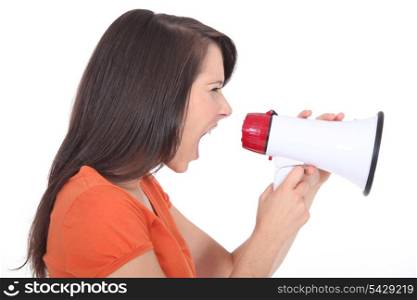 Woman screaming into a megaphone