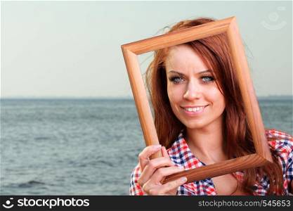 Woman sea sky vacation Holding Frame travel concept