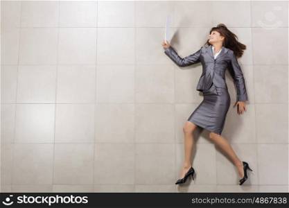 Woman secretary. Funny image of businesswoman running with documents in hand