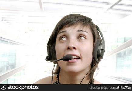 Woman secretary with hands free set answering a call