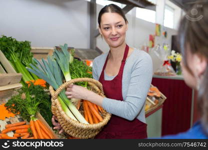 woman selling carrots
