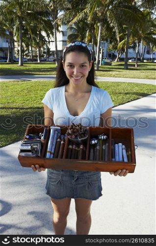 Woman selling cigars at beach