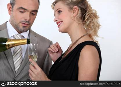 Woman serving champagne