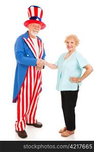 Woman shakes hands with Uncle Sam. Isolated on white. Metaphor for citizenship or immigration.