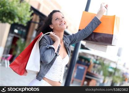 Woman shaking up bags