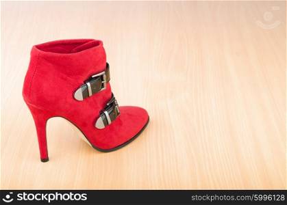 Woman shoes in the fashion concept