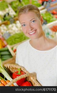 Woman shopping for fresh vegetables