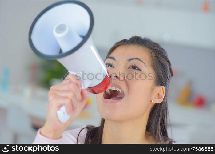 woman shouting on the megaphone