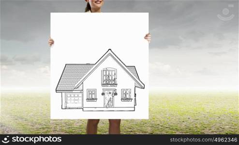Woman show banner. Unrecognizable woman holding placard with house symbol