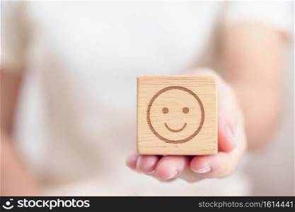 Woman show Happy Smile face block, Mental health Assessment, Psychology, Health Wellness, Feedback, Customer Review, Experience, Satisfaction Survey, Positive Thinking and World Mental Health day