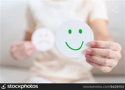 Woman show Happy Smile face paper, Mental health Assessment, Psychology, Health Wellness, Feedback, Customer Review, Experience, Satisfaction Survey, Positive Thinking and World Mental Health day