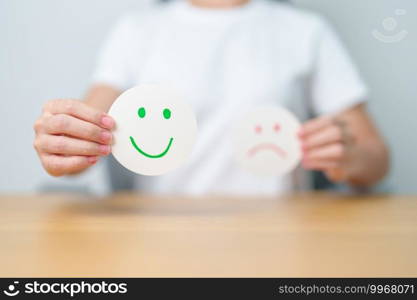 Woman show Happy Smile face paper, Mental health Assessment, Psychology, Health Wellness, Feedback, Customer Review, Experience, Satisfaction Survey, Positive Thinking and World Mental Health day