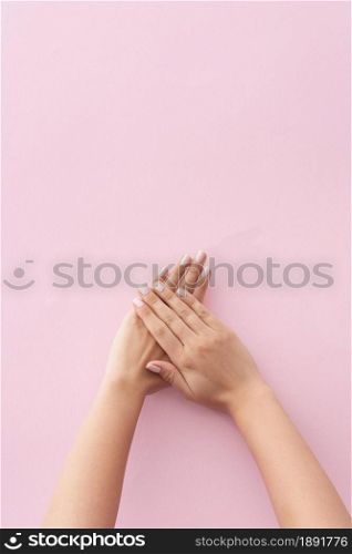 woman showing her manicure on pink background. Resolution and high quality beautiful photo. woman showing her manicure on pink background. High quality and resolution beautiful photo concept