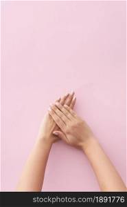 woman showing her manicure on pink background. Resolution and high quality beautiful photo. woman showing her manicure on pink background. High quality and resolution beautiful photo concept