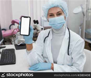 woman showing phone with blank screen