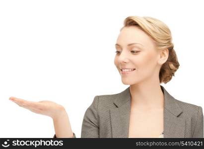 woman showing something on the palm of her hand