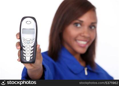 Woman showing telephone