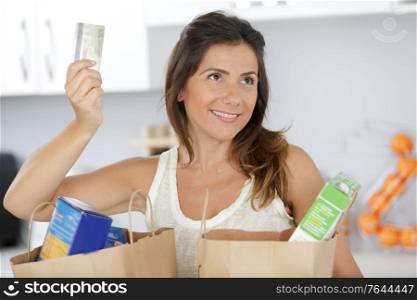 woman showing the shopping list