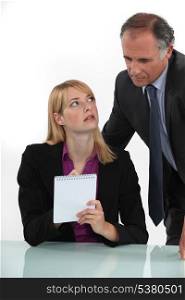 Woman silently communicating with her boss