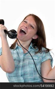 Woman singing down phone