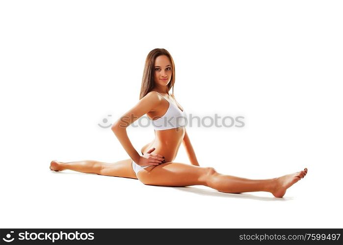 woman siting on gym split on white background