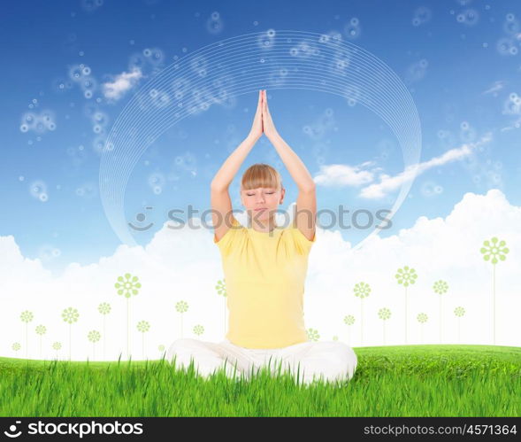 Woman sitting and meditating. Picture of sitting young woman in meditation