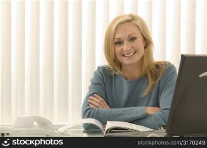 Woman Sitting at Desk
