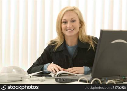 Woman Sitting at Desk