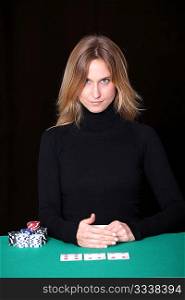 Woman sitting at poker table