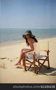 Woman sitting in a beach chair