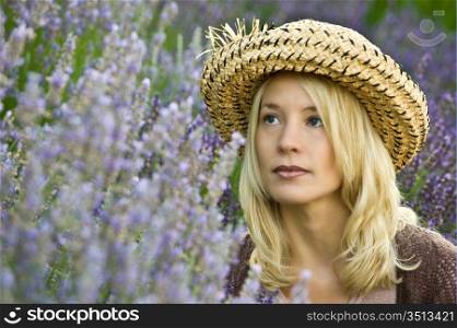 Woman Sitting In Lavender Bushes