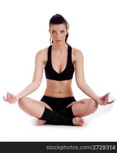 Woman sitting in meditation posture over white background