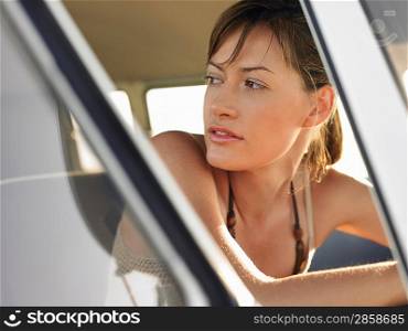 Woman Sitting in Van
