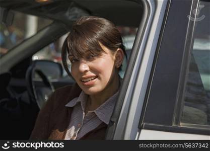 Woman sitting inside the car