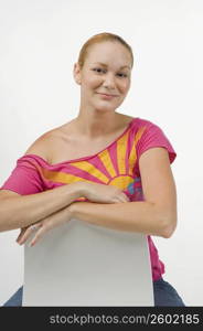 Woman sitting on a chair and smiling