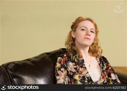 Woman Sitting on Couch