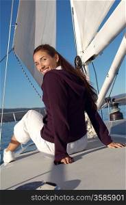Woman Sitting on Sailboat