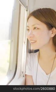 woman sitting on train