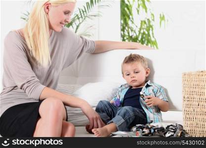Woman sitting with a little boy