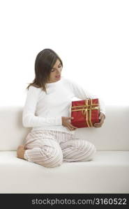 Woman sitting with gift