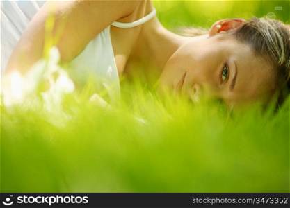 woman sleep on green grass