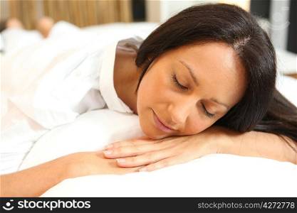 woman sleeping in her bed