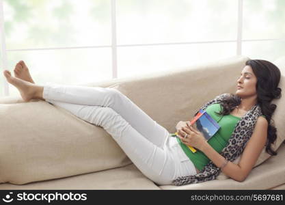 Woman sleeping on a sofa