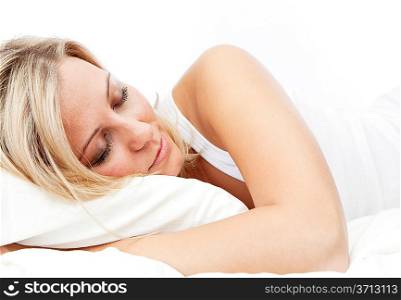 woman sleeping on her bed at home