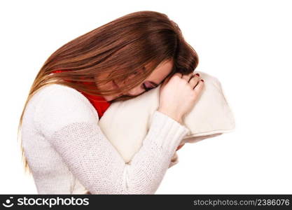 Woman sleepy tired girl holding pillow almost falling asleep. Health balance sleep deprivation concept. Female student or worker with lack of slumber on white. Girl relaxing on pillow.