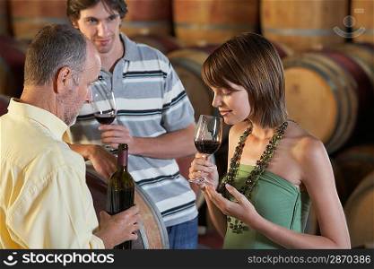 Woman Smelling a Glass of Wine
