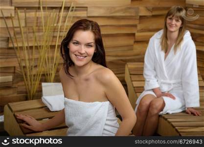 Woman smiling at spa center enjoy wellness treatment