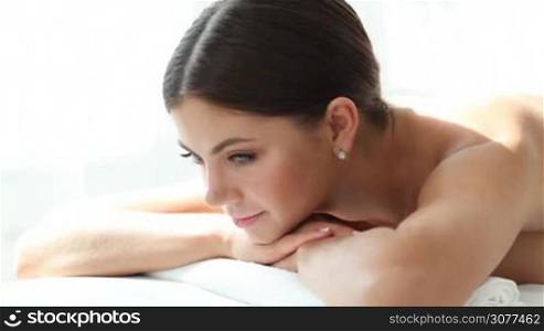 Woman smiling at spa session