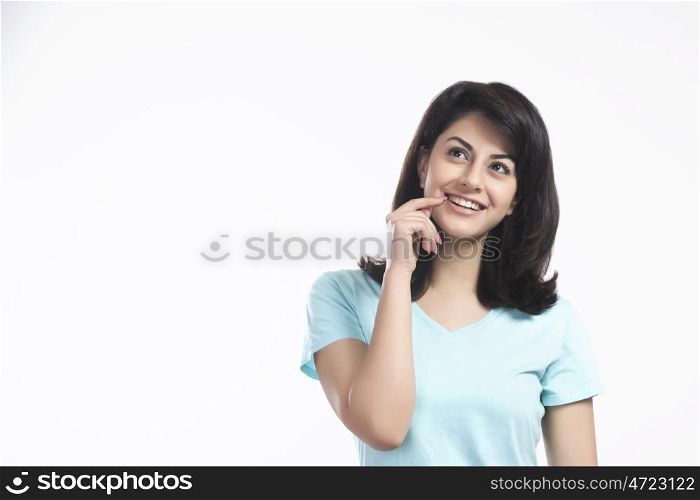 Woman smiling while in thought