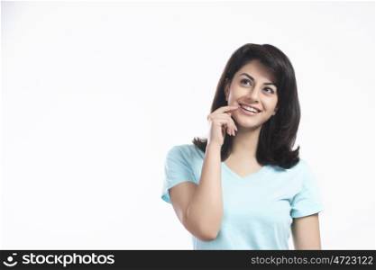 Woman smiling while in thought
